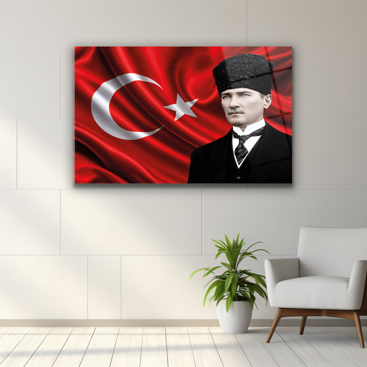 Kırmızı ay yıldız fonlu siyah beyaz kalpaklı lider portresi